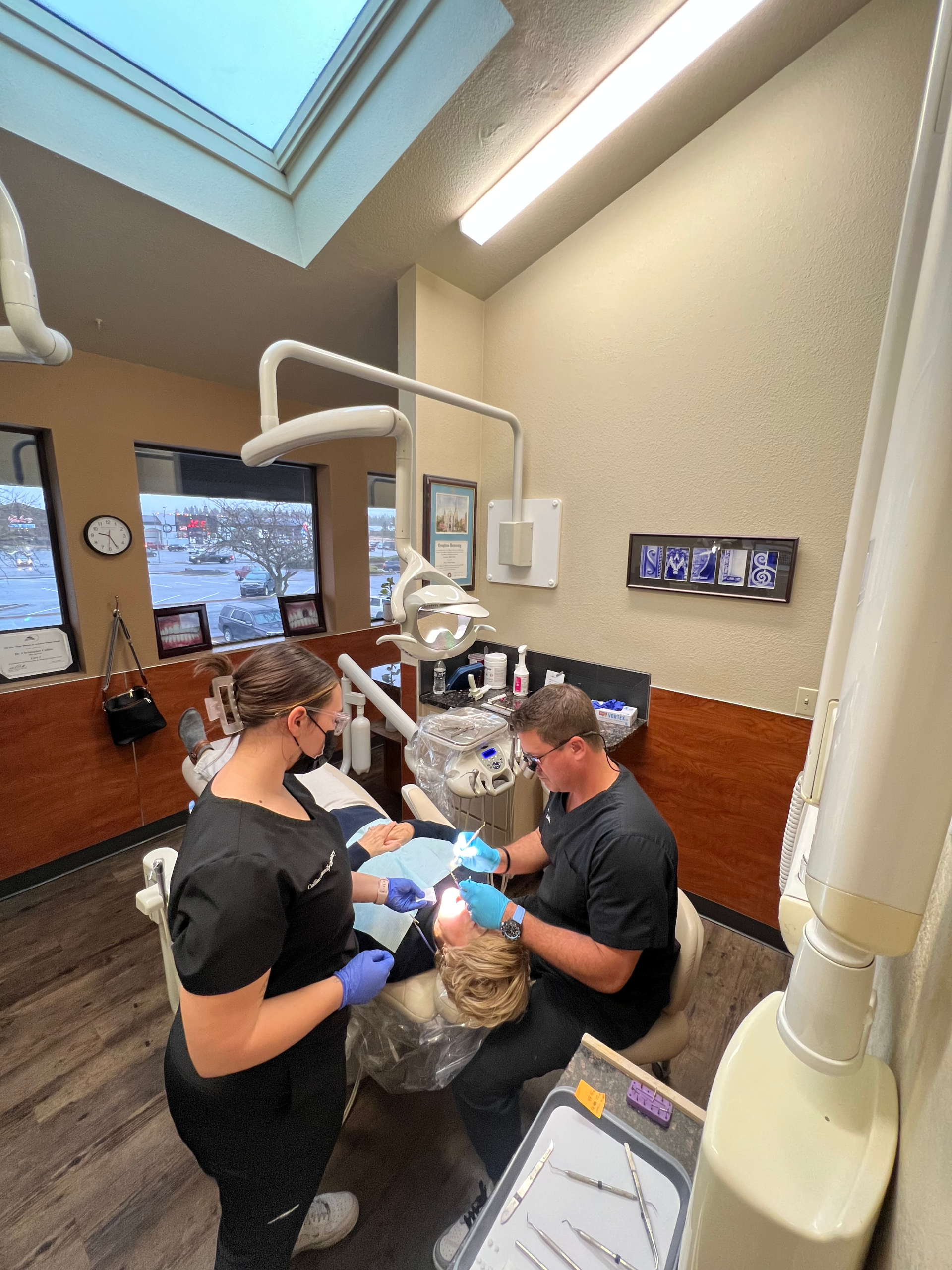 Dr. Chris Collins providing dental treatment in the Cheney office